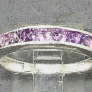 Chuck Clemency 7 Stone Lavender Amethyst Band RingThis pink crystal is thought